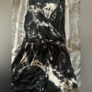 Elegant Black and Cream Jumpsuit with Modern Flair